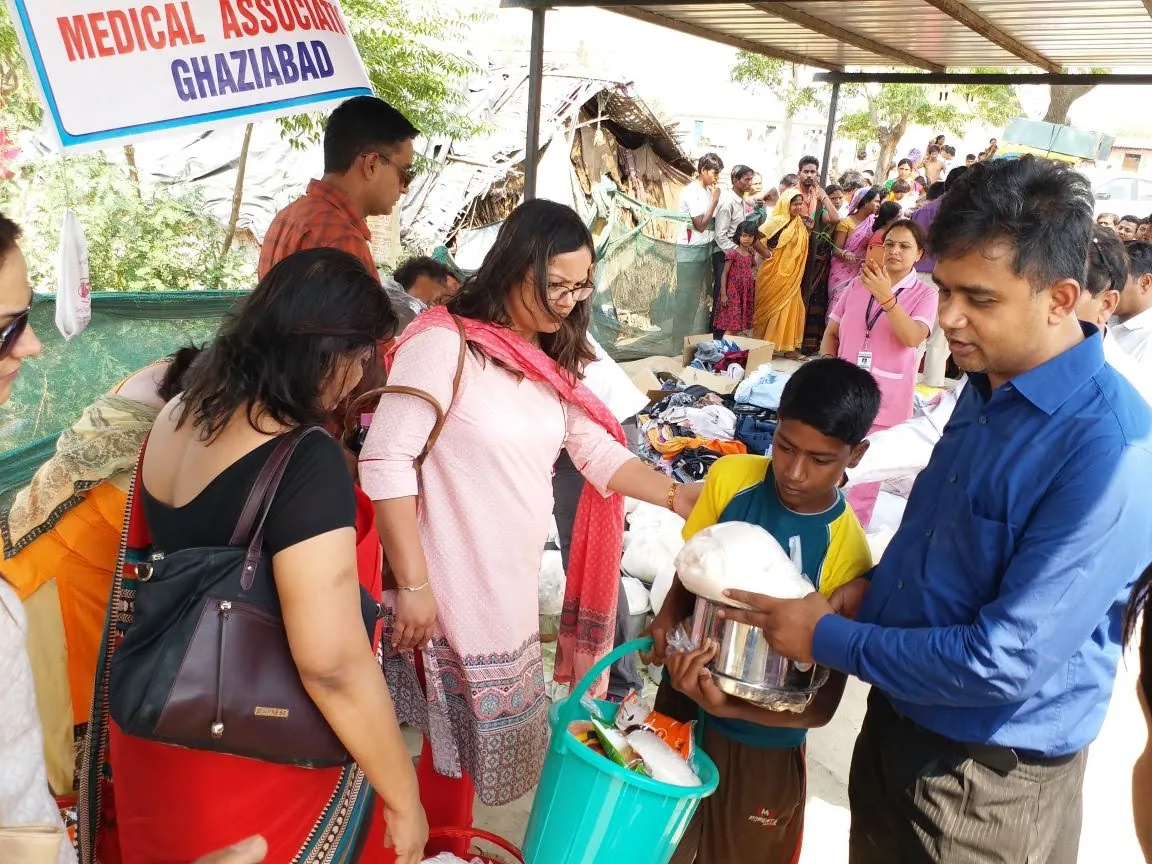 Preparing and distributing meals during a relief activity.