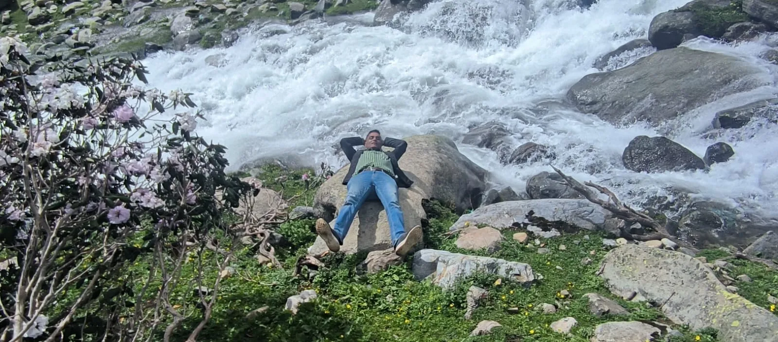 Resting beside a mountain river in Kashmir, India.
