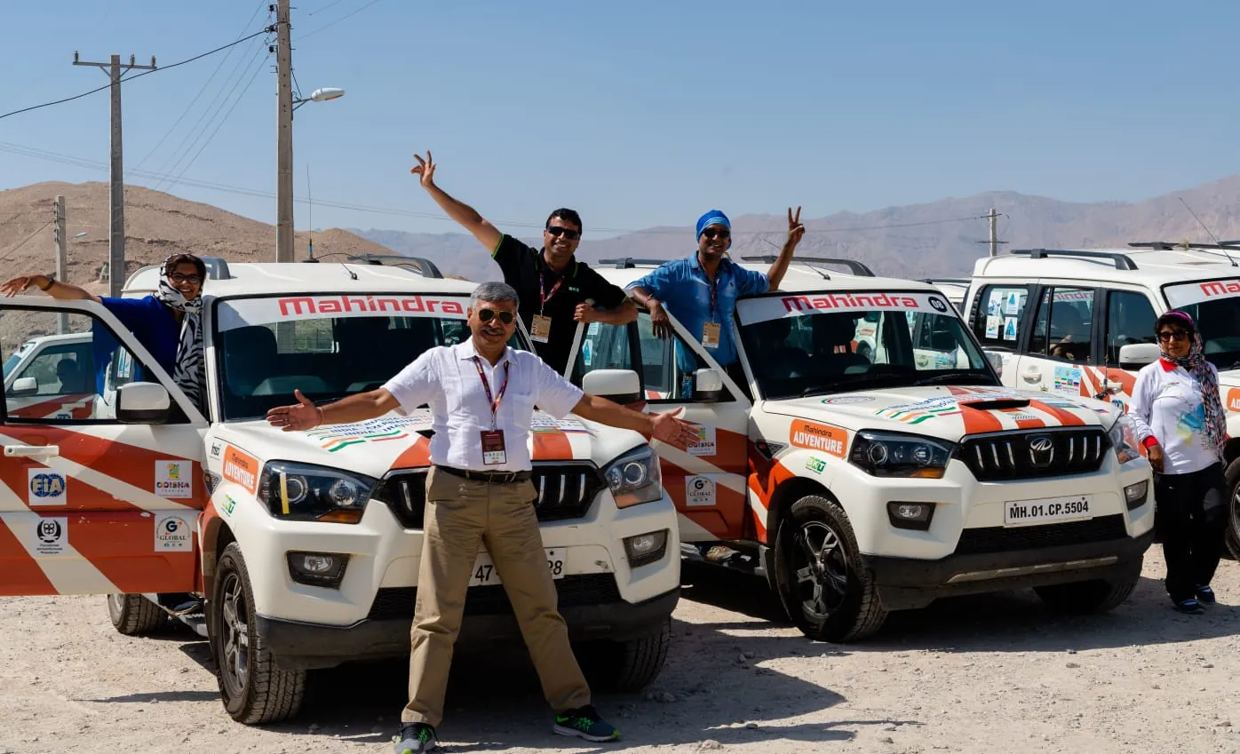 With fellow participants in Iran during the 2018 International North-South Transport Corridor car rally.